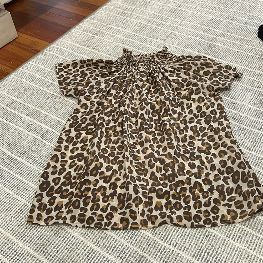 Rungolee leopard mock neck blouse
